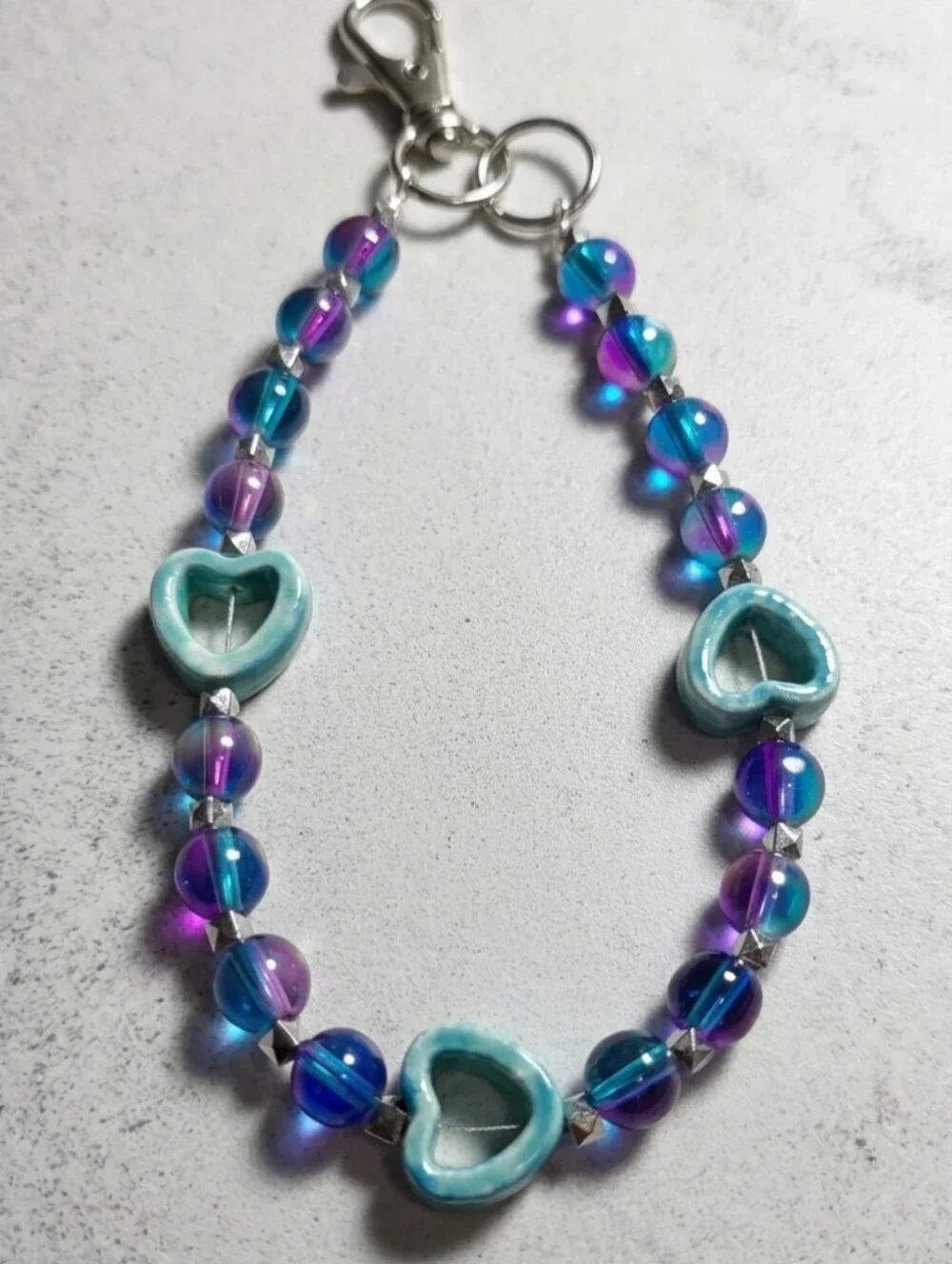 Handcrafted Iridescent Blue & Purple Glass Bead Heart Phone Wristlet